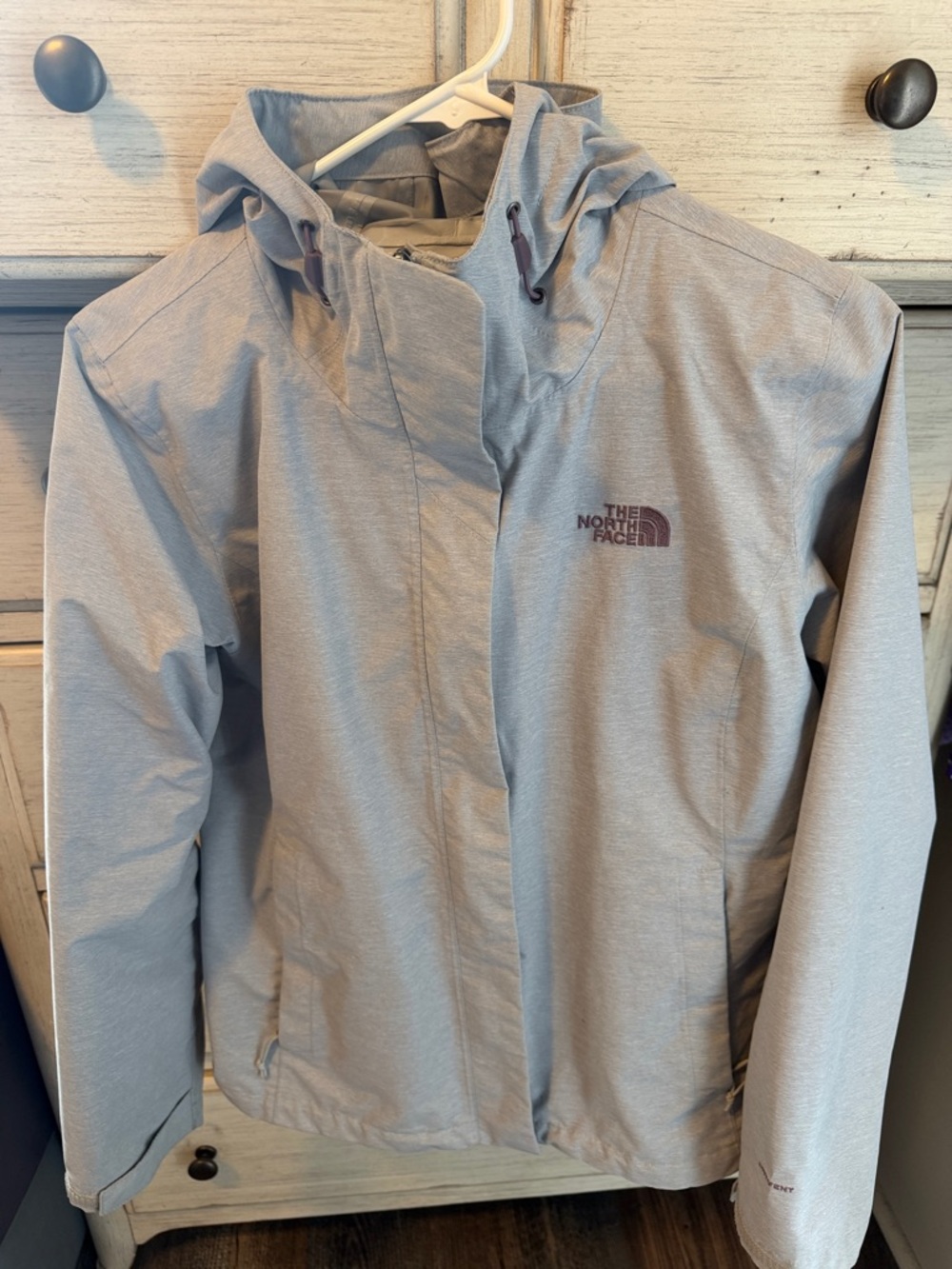 The North Face Heather Light Gray Hooded rain jacket
